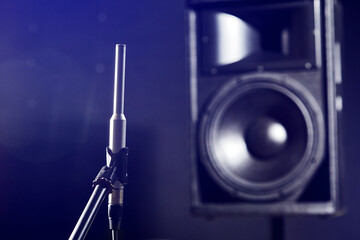 Sound acoustic testing in studio. The noise meter measures the volume of the speakers and the speaker system.