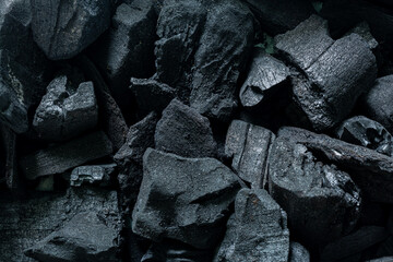 Macro charcoal texture,black coal texture, coal for barbecue, space for text