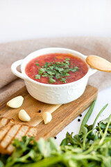 Traditional Russian borscht with herbs and garlic