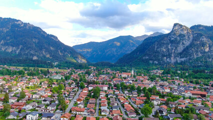 Fototapeta na wymiar Aerial view over the city of Oberammergau in Bavaria Germany. High quality 4k drone footage