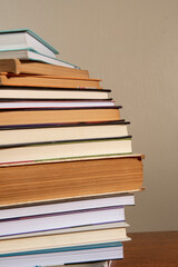Close-up of background stack of old used books. Pile of vintage old books. Back to school