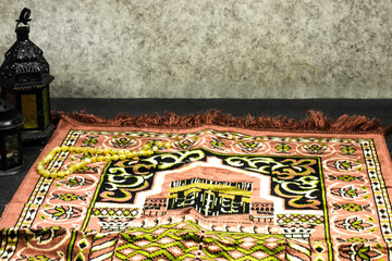 Oriental Lamp, prayer mat and rosary Ramadan Kareem Greeting Card. Ramadan Mubarak. Translated: Happy & Holy Ramadan. Month of fasting for Muslims