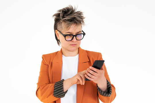 Happy queer person holding mobile