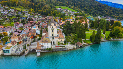 Fototapeta na wymiar Famous Castle Oberhofen at Lake Thun in Switzerland - drone footage