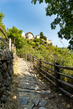 Vertical shot of a trail leading up to Castle Juval in Italy