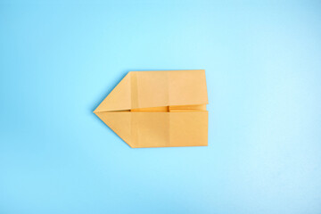 Origami Bunny. Step-by-step photo instruction on a blue background. Easter bunny. DIY concept Step5. Rabbit 2023