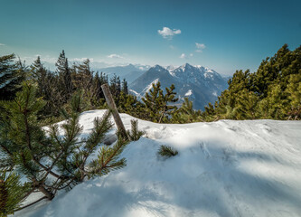 Jochberg snow landscape mountain peak with the Walchensee lake in panorama style