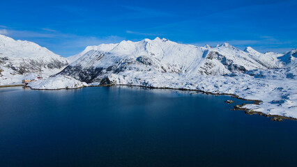 Fototapeta na wymiar Aerial view over a beautiful glacier in Switzerland - drone footage