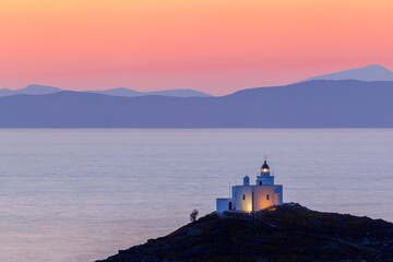 Beautiful sunset with the lighthouse of Vourkari village, in Kea (or Tzia) island, in Cyclades islands, Aegean Sea, GREECE, Europe © YiannisMantas