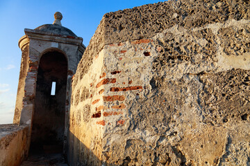 Caribbean tropical sunset hits the colonial wall of Cartagena, Colombia © Dandrewp/Wirestock Creators