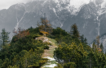 Beautiful view of mountains covered by snow on a moody day in the Julian Alps in Slovenia
