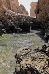 Natural marine pool sculpted by waves-Algar Seco natural monument. Carvoeiro-Portugal-181