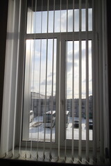 Office window with vertical blinds