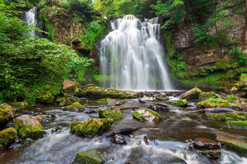 Drop of a waterfall, Lynn Falls, Caaf Water, Lynn Glen, Dalry, North Ayrshire, Scotland, UK
