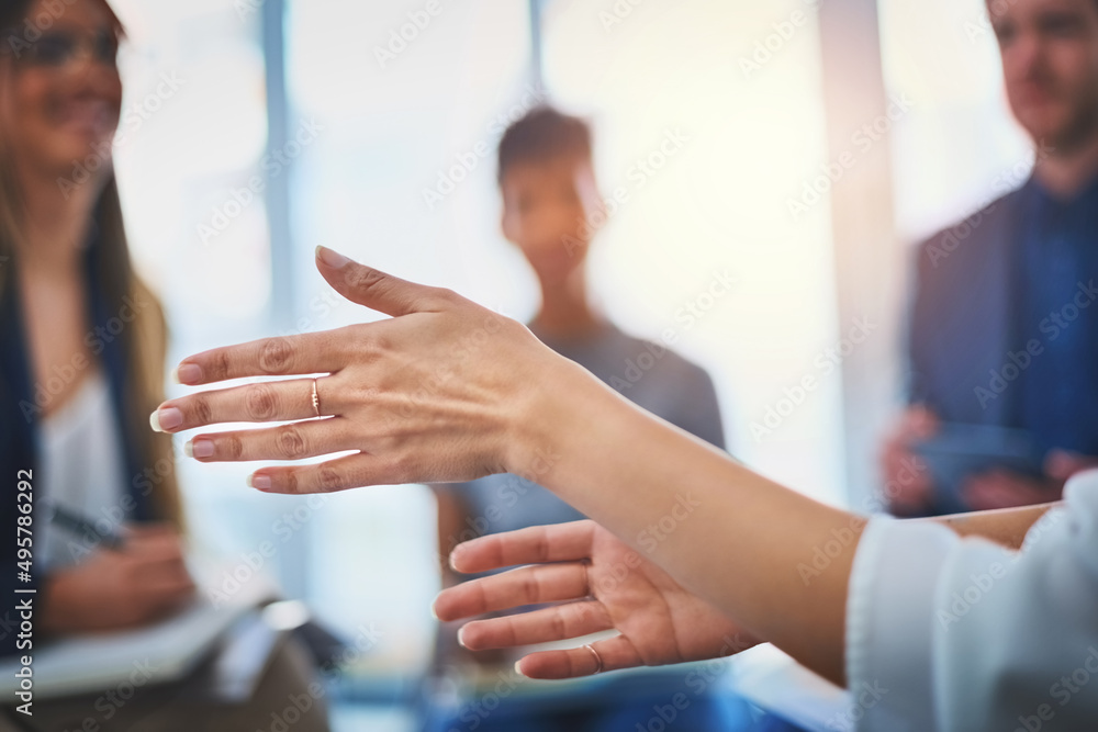 Poster welcome aboard. closeup shot of an unrecognzable businesswomans hands gesturing during a meeting wit