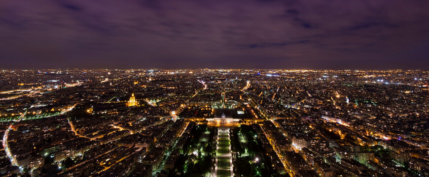 Paris city at night, France. View from Eiffel Tower top