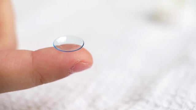 close-up. contact lens on a child's finger. 