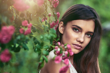 Naklejka premium Her beauty will enchant you. Cropped shot of a beautiful young woman posing in nature.