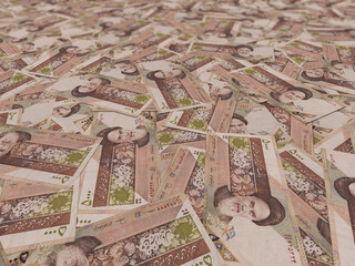 Dozens of iranian paper money on the gorund