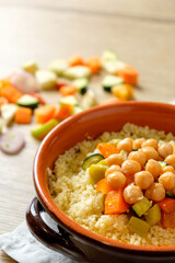 vegan cous cous vith chickpeas and vegetables, traditional dish of north africa