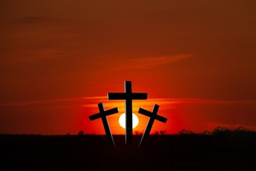 Crucifixion and resurrection, crosses against the sunset background