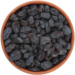Black dried raisins in a brown ceramic bowl isolated on white background.