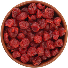 Red dried cherries in a brown ceramic bowl isolated on white background.