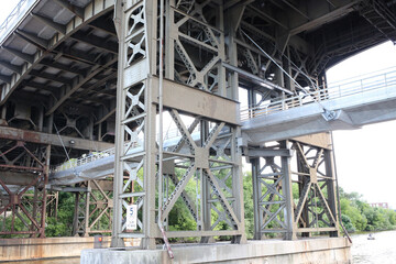 Closeup of the Milwaukee bridge from underneath - obrazy, fototapety, plakaty