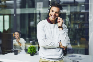 Call us for excellent service thatll far surpass your expectations. Shot of a young call centre...