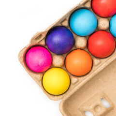 Fototapeta na wymiar Dyed bright pastel Easter eggs on white background