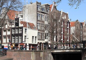 Amsterdam Haarlemmerdijk and Korte Prinsengracht Street View with Traditional House Facades and Bridge, Netherlands