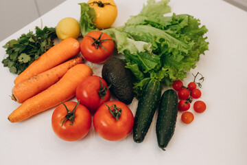 food for cooking on the table. Tomatoes. Carrots. Avocado