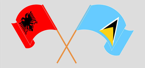 Crossed flags of Albania and Saint Lucia. Official colors. Correct proportion