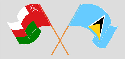 Crossed flags of Oman and Saint Lucia. Official colors. Correct proportion