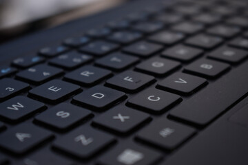 Selective focus of keyboard letters - obrazy, fototapety, plakaty