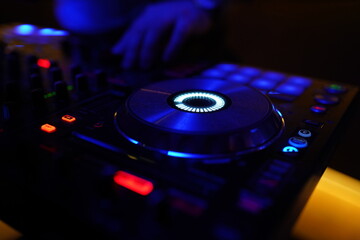 Fototapeta na wymiar Mixer for audio, DJ remote control. Neon 