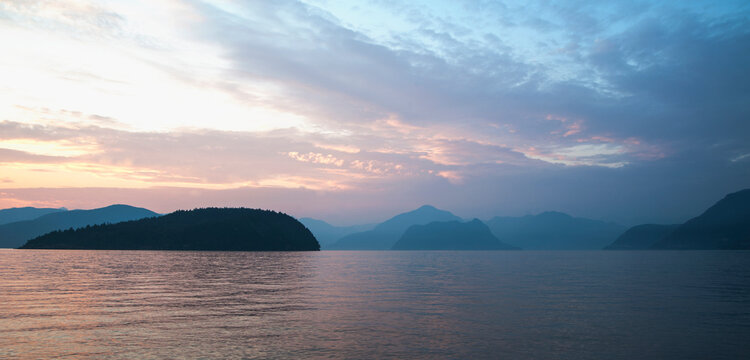 Dawn sky over peaceful Howe Sound, off West Vancouver.