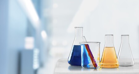 Laboratory glass flask and beaker and medical science laboratory background