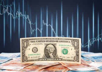 One US Dollar on Russian ruble. Money background. Currency exhange. Economic crisis. Rouble dollar cash. Hundred dollar bill and 5000 rubles. Business and finance. Russia and USA