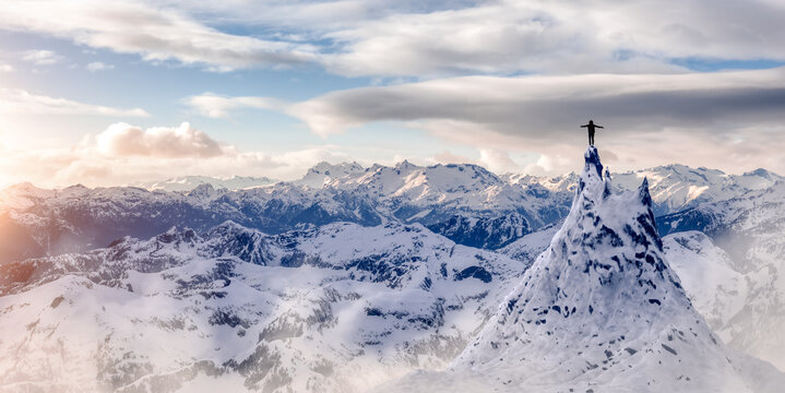 Adventurous Woman Hiker standing on top of icy peak with rocky mountains in background. Adventure Composite. 3d Rendering rocks. Aerial Image of landscape from British Columbia, Canada. Cloudy Sky