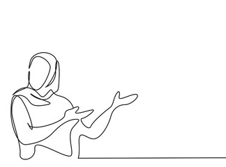 happy beautiful muslim woman in hijab showing something with hands