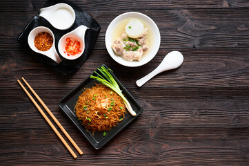 Fototapeta na wymiar Rice noodles with pork bone stock