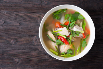 Thai Spicy chicken clear soup , tom yum kai,