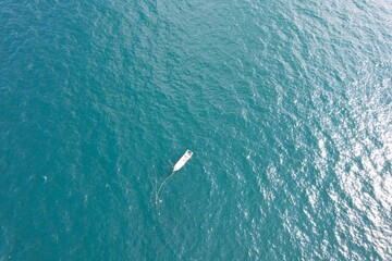 Empty boat in the middle of the ocean