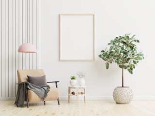 Poster mockup with vertical frames on empty white wall in living room interior.