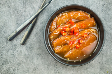 Salmon marinated shoyu or salmon pickled soy sauce in Korean style