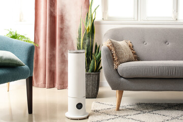 Modern humidifier in interior of living room