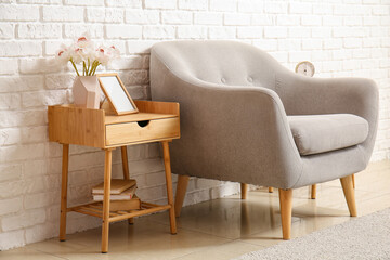 Modern interior of room with table and armchair