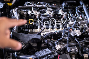 Engine car service mechanic maintenance inspection service maintenance car Check engine oil level...