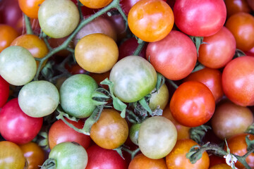 Fresh tomatoes top view closeup (lycopersicon esculentum)on background